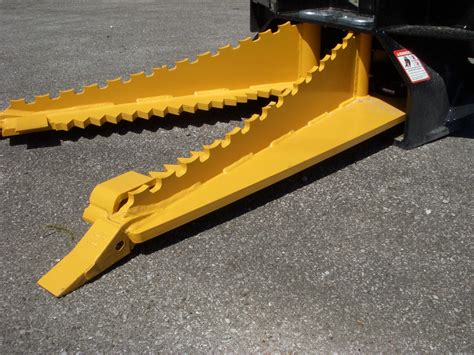 used skid steer tree puller for sale|intimidator vs dominator tree puller.